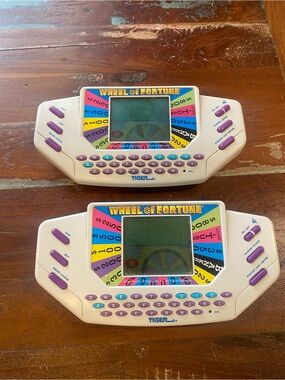 Wheel of Fortune Portable Handheld Game - Tiger - White & Purple